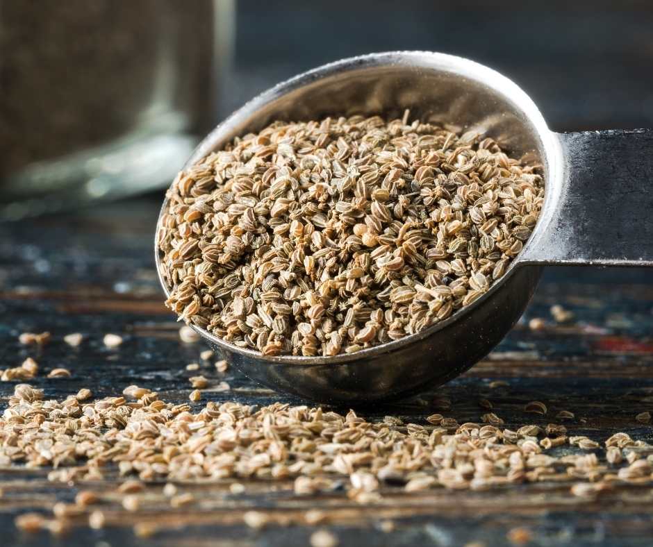 Celery seed in measuring cup