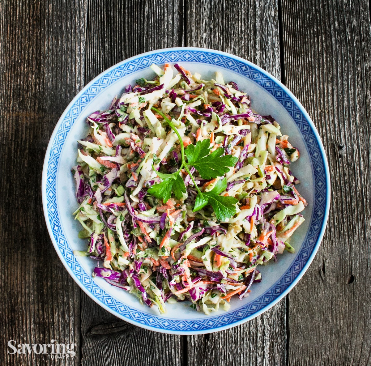 A bowl of creamy coleslaw made with celery seed dressing